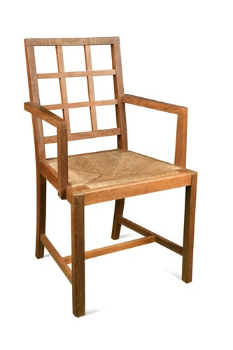 Lot 242 - A Heal's oak lattice back elbow or desk chair