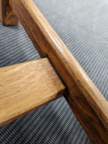 Lot 228 - A Heals oak draw-leaf dining table, circa 1925