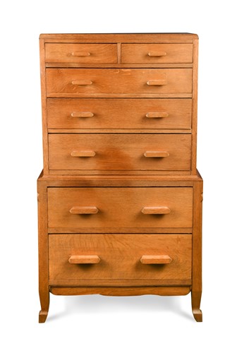 Lot 252 - A Cotswold School oak chest on chest of smaller proportions, circa 1930