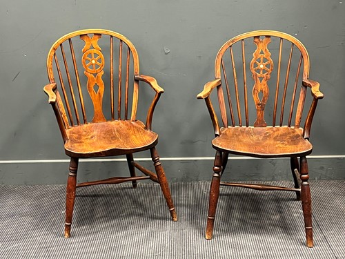 Lot 749 - A near pair of 19th century Windsor wheel back...