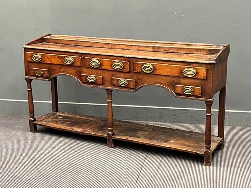 Lot 756 - An 18th century oak dresser base with integral...