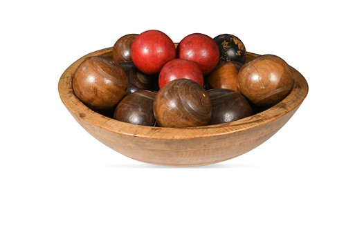 Lot 456 - A collection of lignum lawn bowls