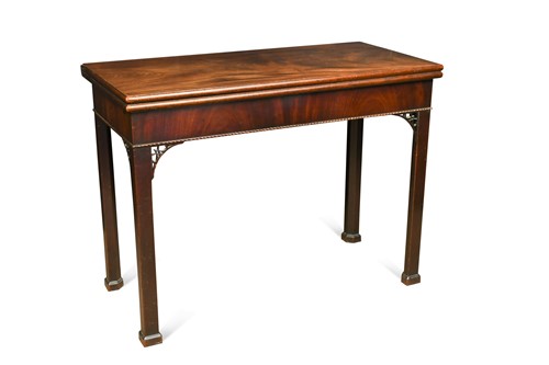 Lot 490 - An early George III fold-over supper table