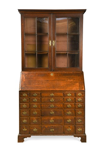 Lot 556 - A George III oak doctors bureau bookcase