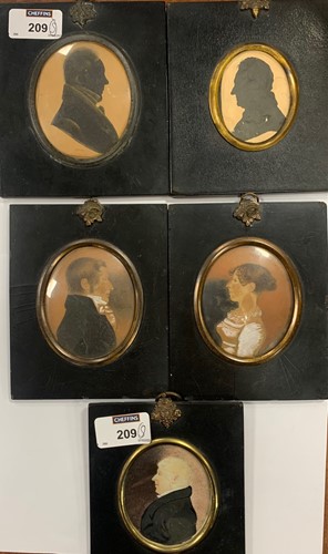Lot 209 - A collection of portrait silhouettes and portrait miniatures on paper