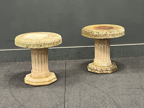Lot 831 - A pair of composite stone plinths, the...