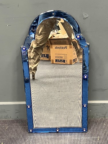 Lot 714 - A Venetian style wall mirror of arched form,...