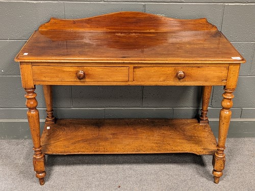 Lot 772 - A 19th century mahogany two-tier side table...