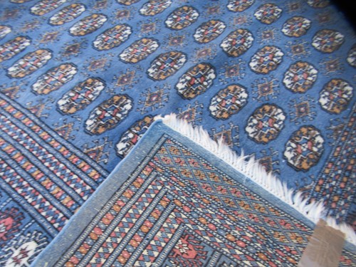 Lot 846 - A modern Teke type rug with slate blue ground...