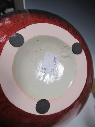 Lot 21 - A modern ovoid vase decorated with coloured...