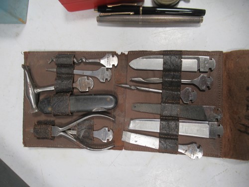 Lot 126 - A miniature carpenters pouch by "Bonsa"...