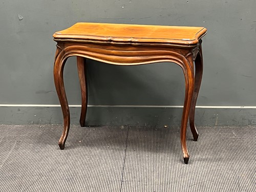Lot 793 - A 19th century simulated rosewood foldover...