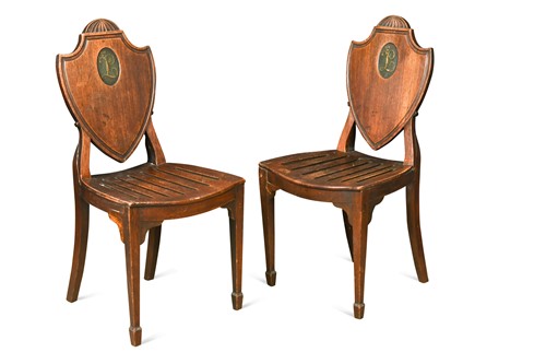Lot 626 - A pair of Regency mahogany hall chairs