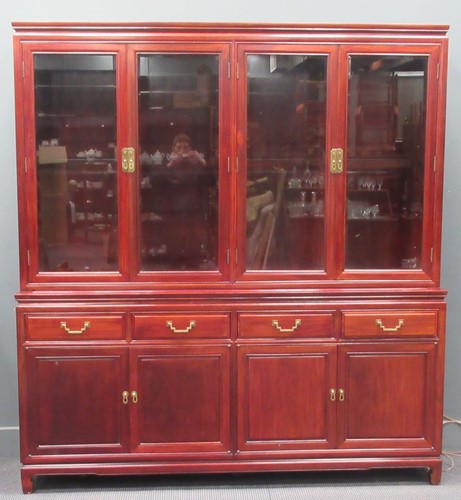 Lot 742 - A Chinese hardwood display cabinet, the...