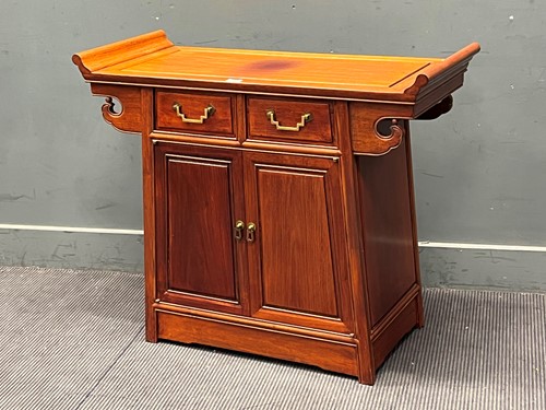 Lot 740 - A Chinese hardwood Altar style side cupboard....