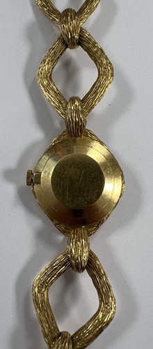 Lot 363 - Roy Cecil King for Bueche-Girod - An 18ct gold wristwatch