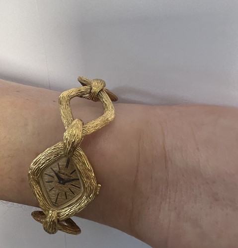Lot 363 - Roy Cecil King for Bueche-Girod - An 18ct gold wristwatch