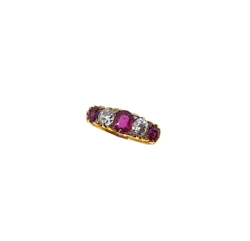 Lot 202 - A ruby and diamond carved half hoop ring