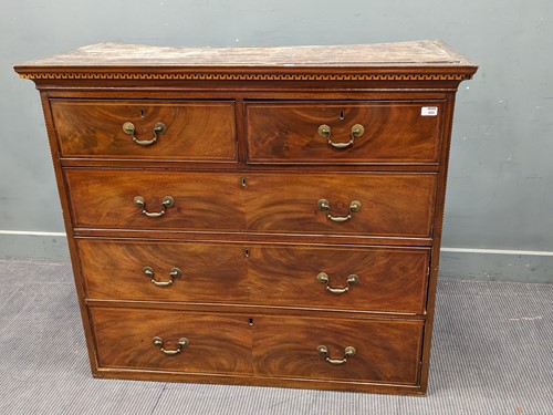 Lot 653 - Early 19th century mahogany chest on later...