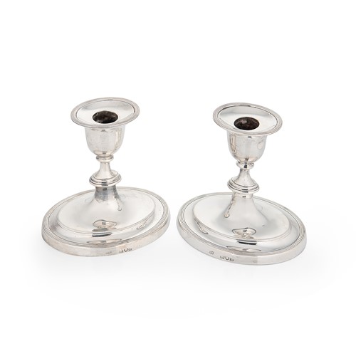 Lot 600 - A pair of Victorian silver library candlesticks