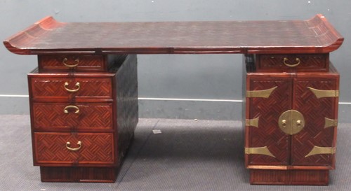 Lot 703 - A large Chinese hardwood partner's desk, the...
