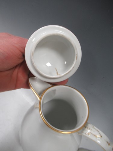 Lot 16 - A KPM factory part tea and coffee service,...