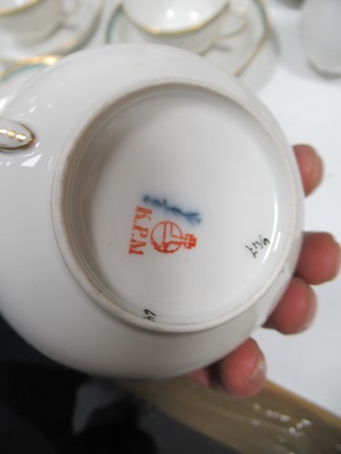 Lot 16 - A KPM factory part tea and coffee service,...