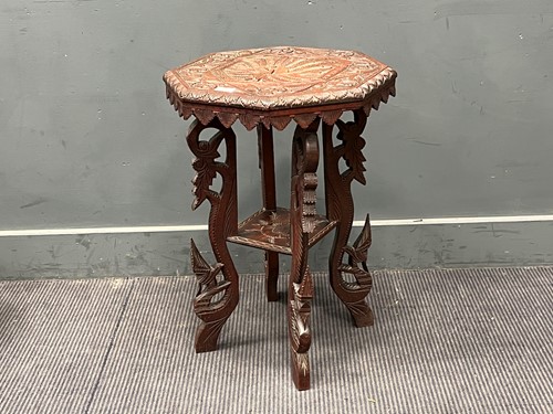 Lot 764 - An Eastern tripod hardwood table, the...
