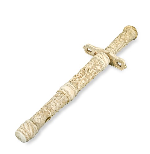Lot 698 - An Eastern European carved bone dagger in sheath