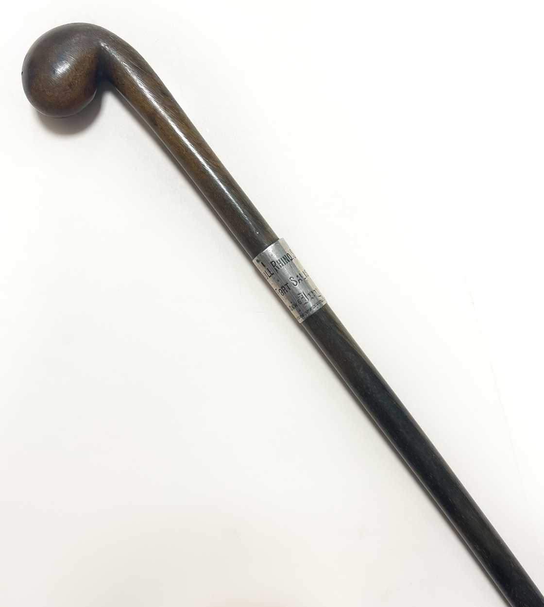 Lot 73 - A rhino horn and silver mounted riding crop,