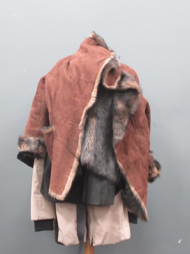 Lot 129 - A ladies' Prada coat and three other coats, a...