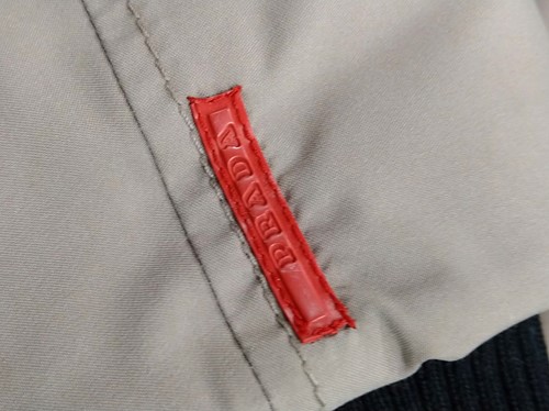 Lot 129 - A ladies' Prada coat and three other coats, a...