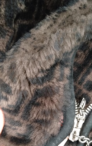 Lot 129 - A ladies' Prada coat and three other coats, a...