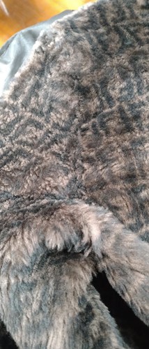 Lot 129 - A ladies' Prada coat and three other coats, a...
