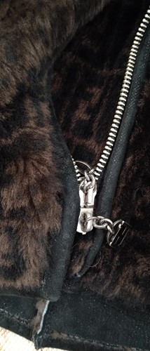 Lot 129 - A ladies' Prada coat and three other coats, a...