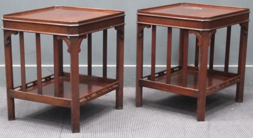 Lot 663 - A pair of mahogany side tables in the George...