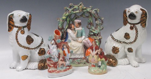 Lot 13 - A Staffordshire pottery figure group of two...