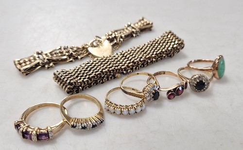 Lot 350 - Two bracelets and a dress ring, tests to 9ct...