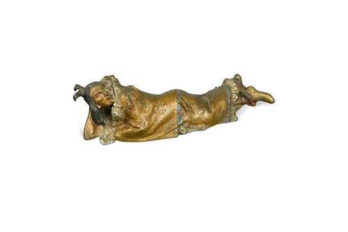 Lot 755 - A Bergman cold-painted bronze model of a reclining Native American