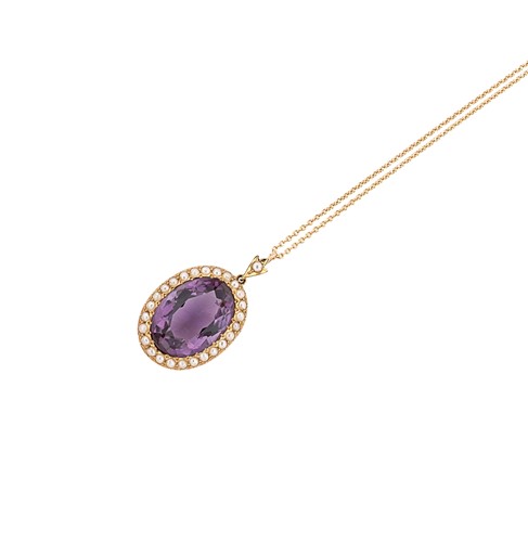 Lot 101 - An amethyst and split pearl pendant and chain