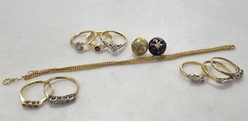 Lot 338 - An 18ct gold dress ring, along with seven gem...