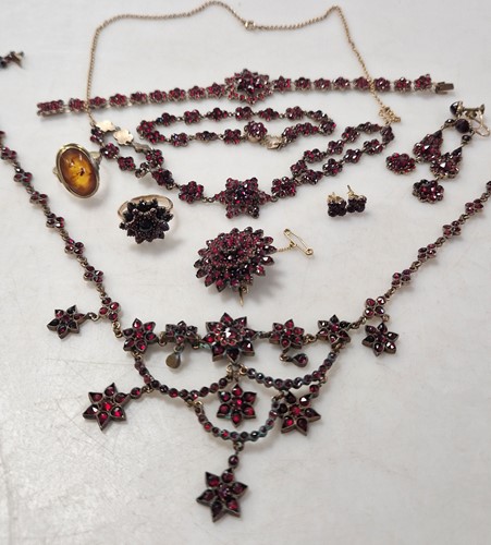 Lot 345 - A collection of garnet set jewellery with base...