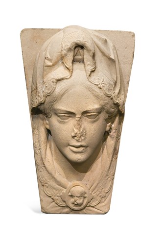 Lot 768 - A figural York keystone
