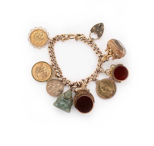 Lot 25 - A late 20th century charm bracelet