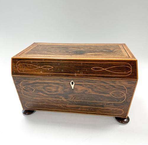 Lot 636 - A rosewood sarcophagus tea caddy, 19th century