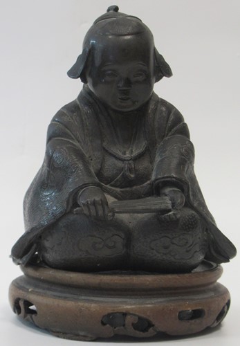 Lot 39 - A Japnese bronze of a kneeling boy, on a...