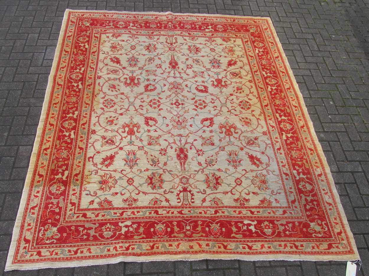 Lot 843 - A ziegler mahal rug with a biege ground colour...