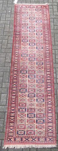 Lot 833 - A Caucasian styel runner with a cream ground...