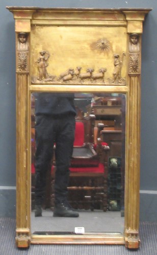 Lot 819 - A gilt wood pier mirror in the Egyptian taste,...