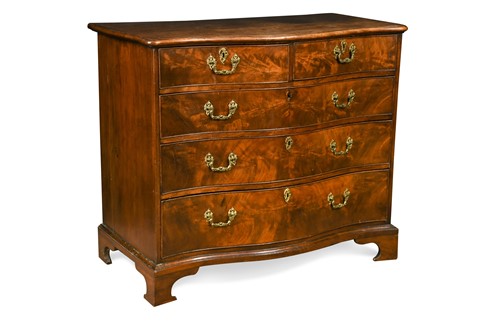 Lot 492 - A George III mahogany serpentine chest